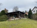 Charmantes Holzhaus auf großem Baugrundstück in Maschen Heide - Rückseite